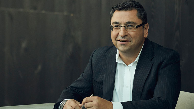 Professional man at desk with notebook