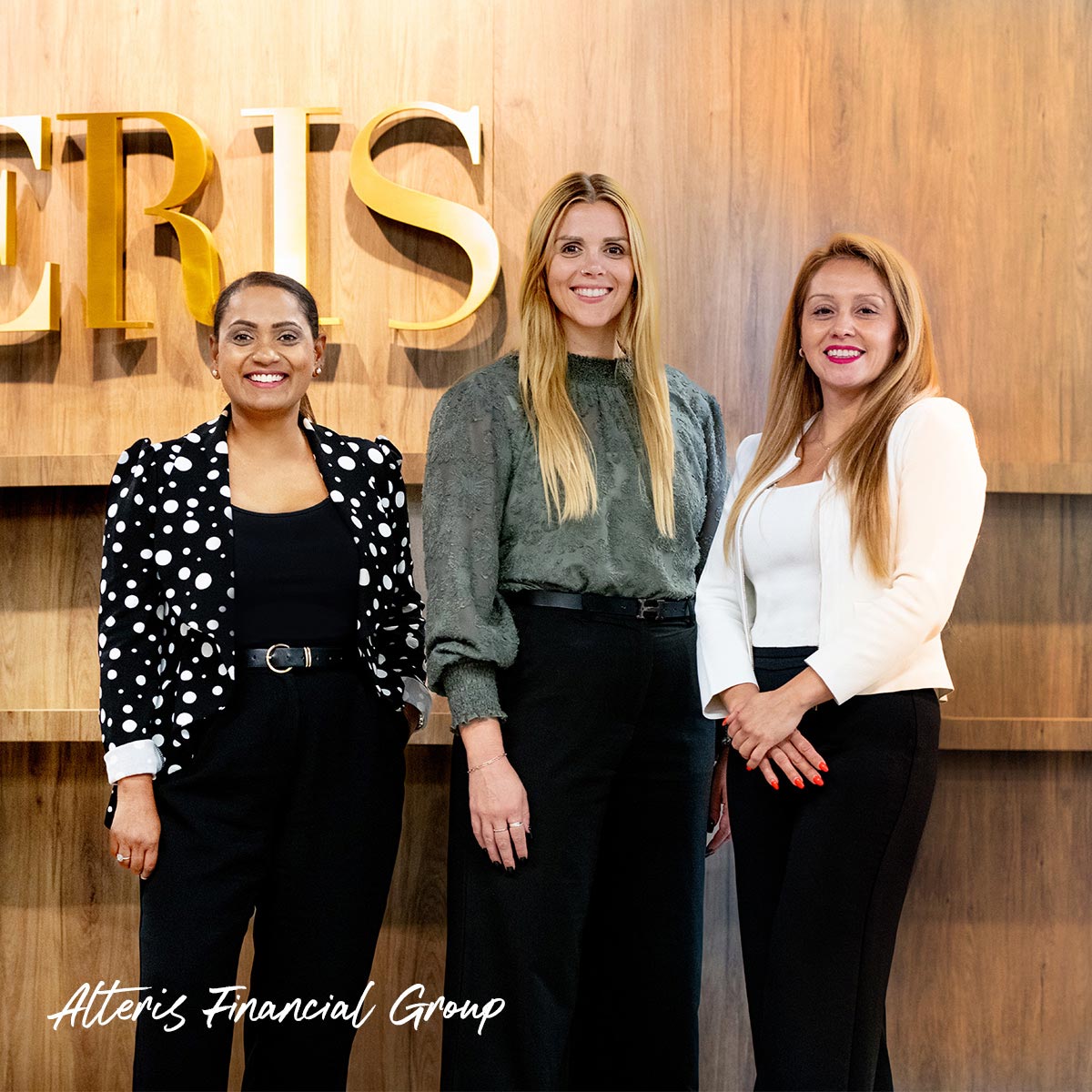 Smiling women of Alteris Financial Group