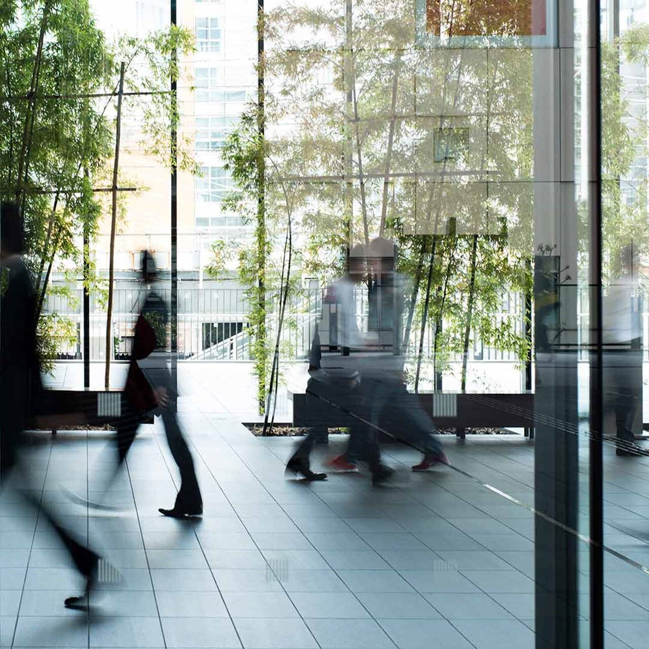 business person walking in a urban building