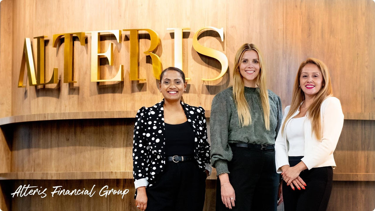 Smiling women of Alteris Financial Group