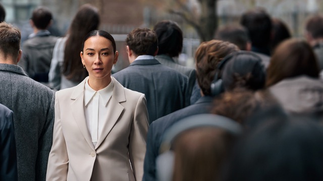 Business woman in crowd
