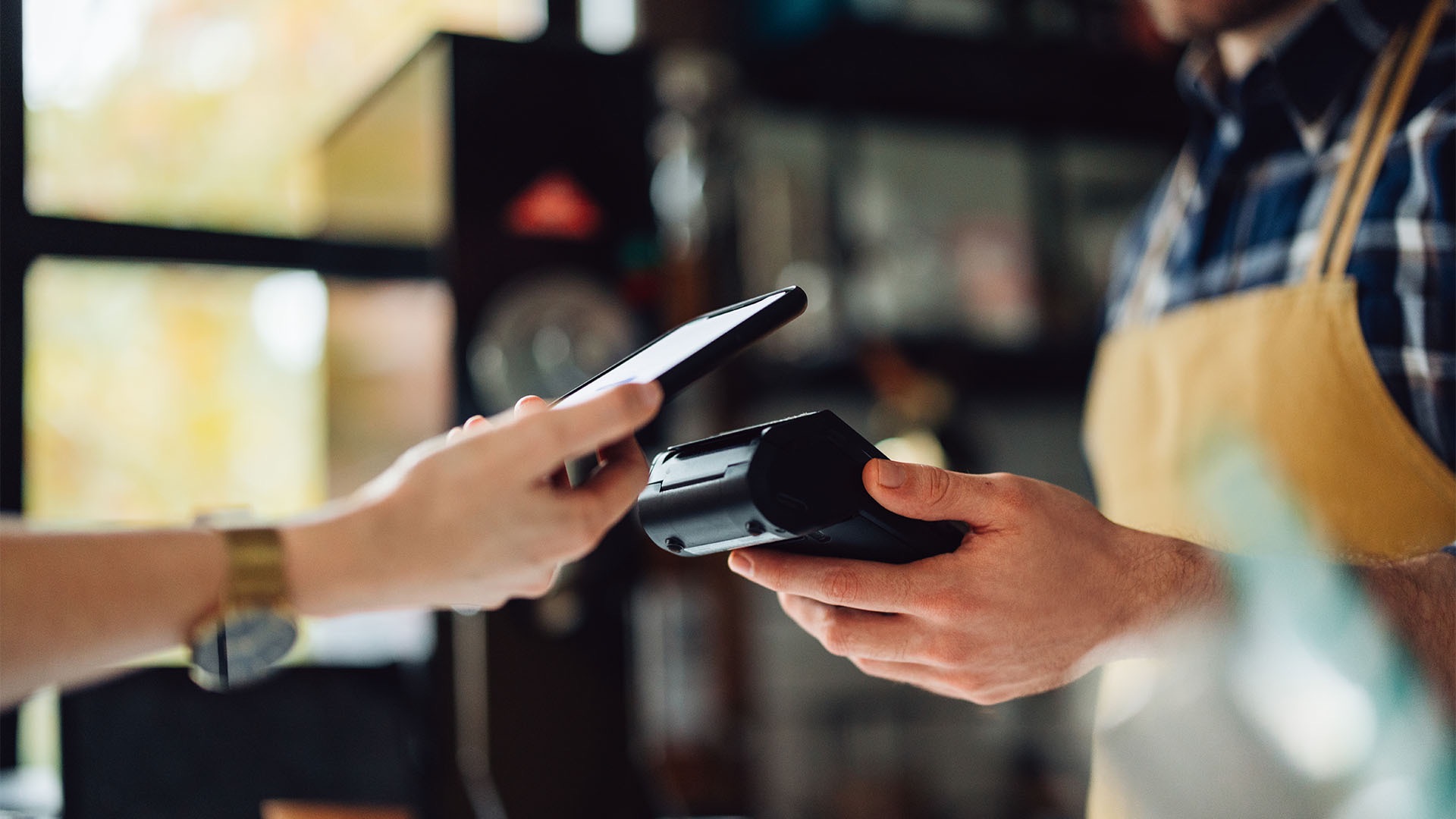 Mobile phone payment at a shop