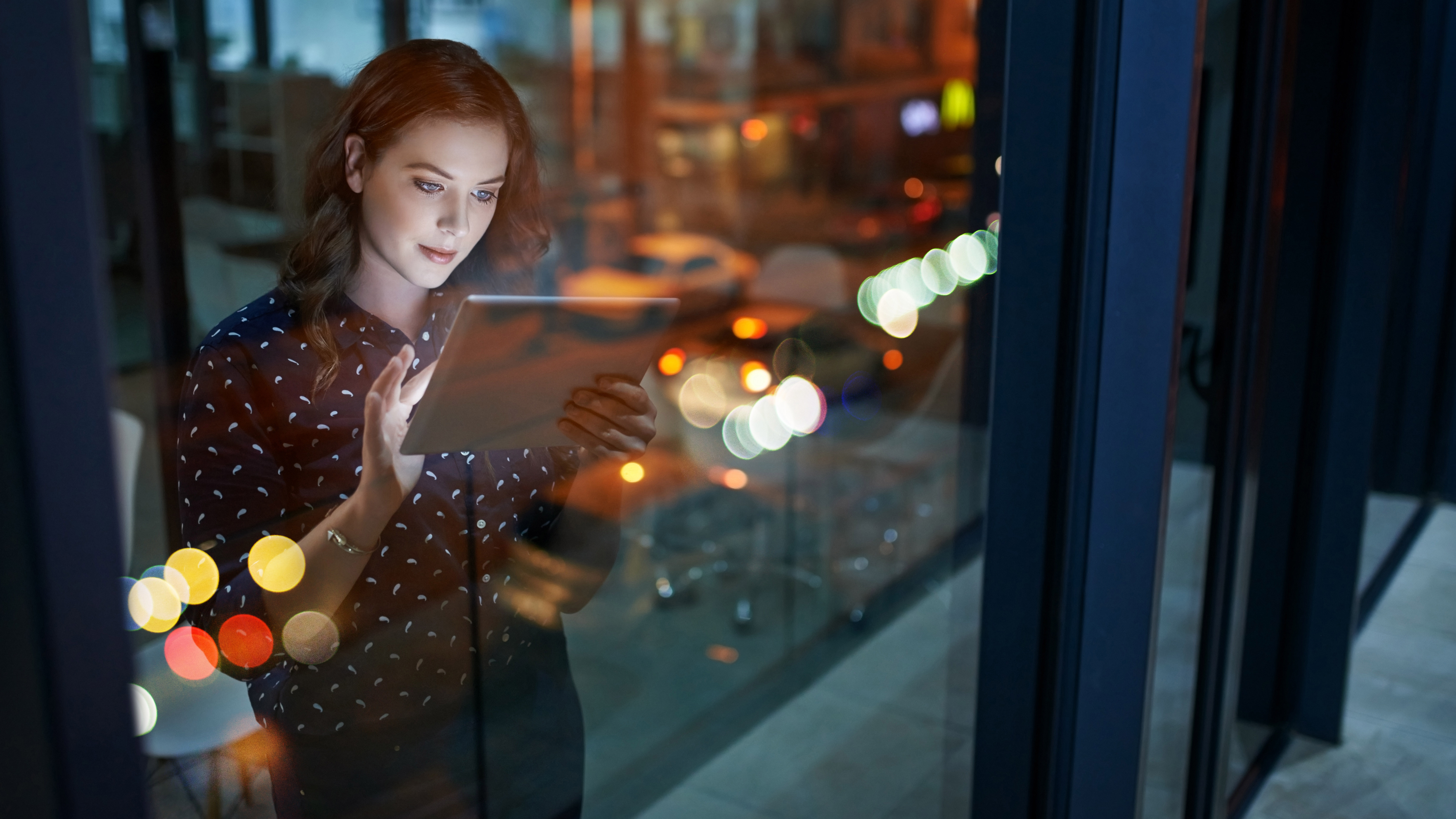 Woman viewing an Ipad