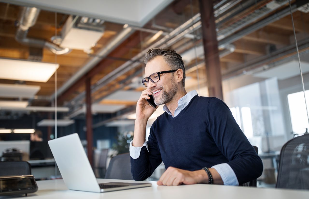 Businessman working in a new office - Purchase date 18 June 2019. GettyImages-1132121143