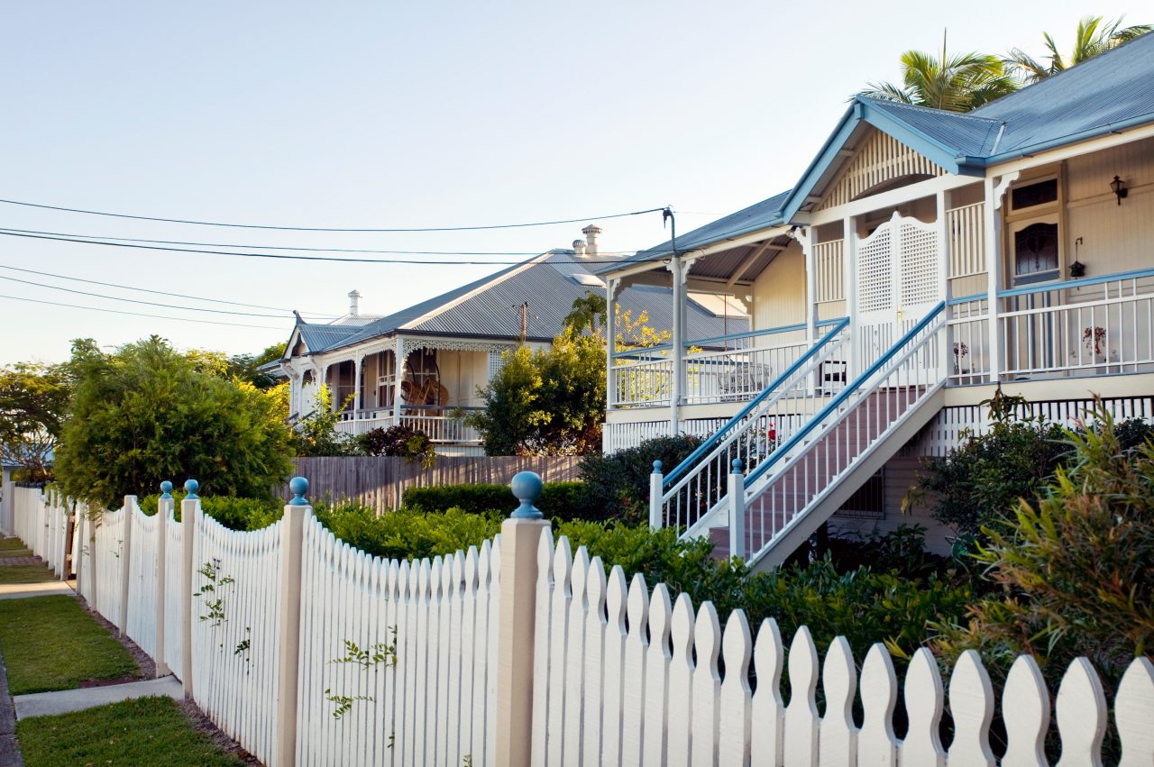 Residential house with white picket fence