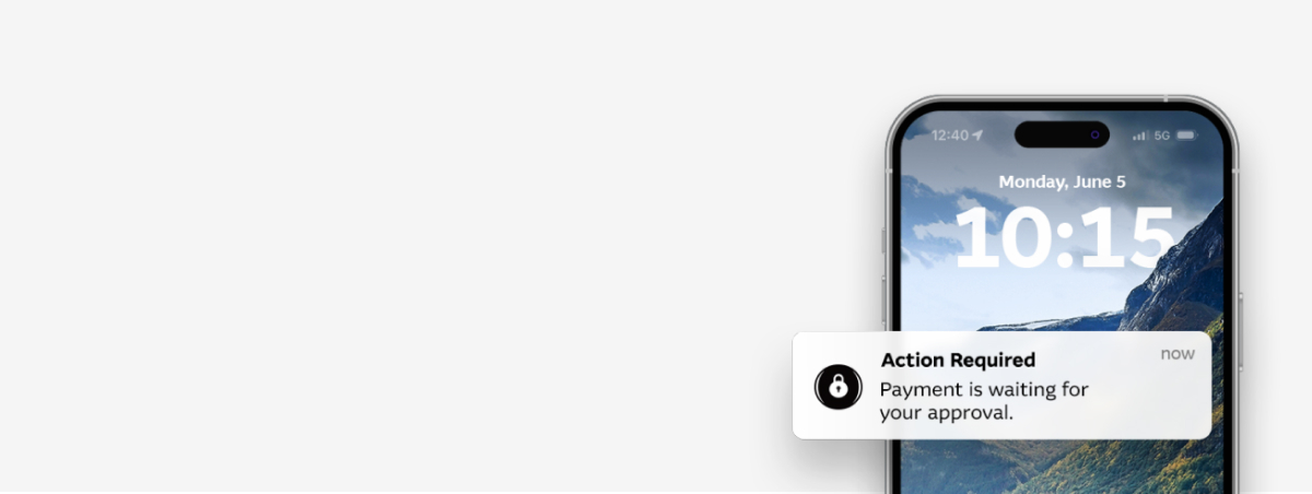 Mobile phone showing a Macquarie Authenticator security notification on screen