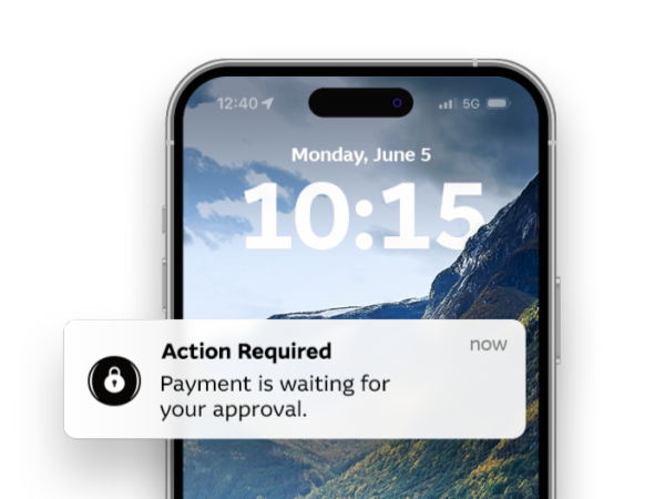 Mobile phone showing a Macquarie Authenticator security notification on screen