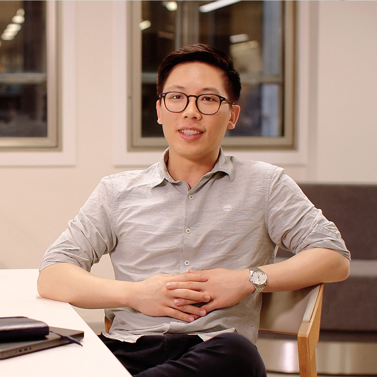 Hubert Macquarie customer business man with glasses sitting in office