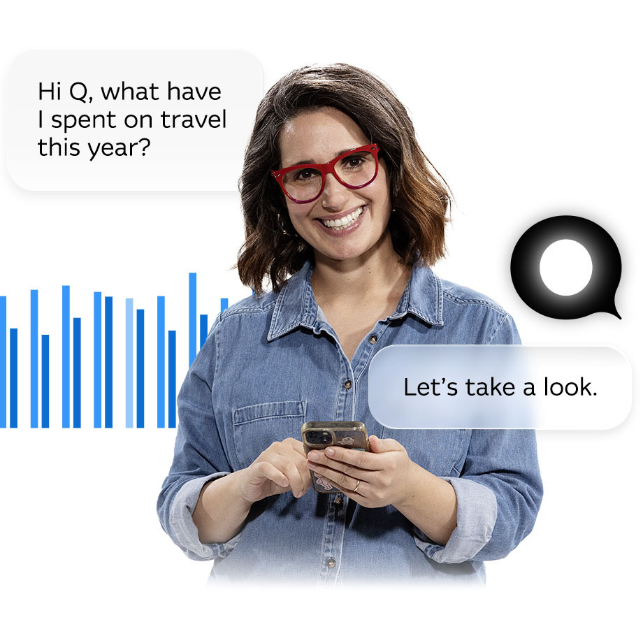 Laura holding her phone smiling