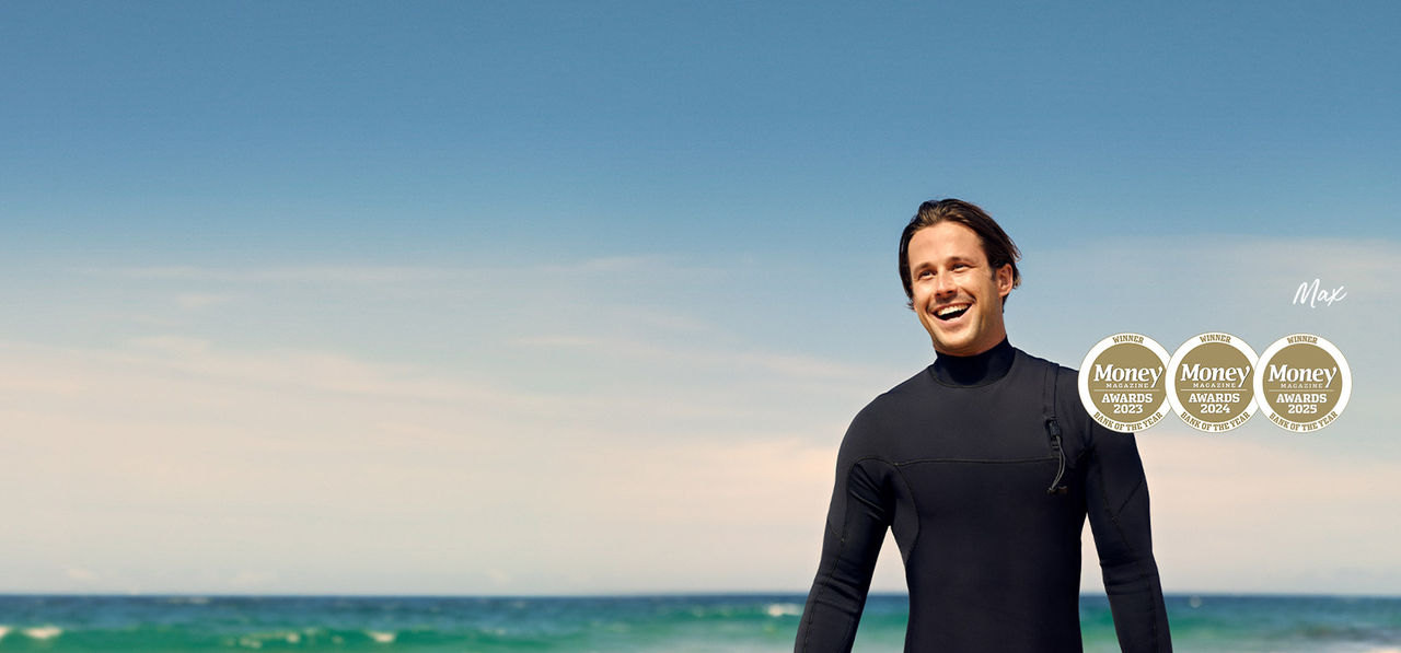 Max smiling on the beach