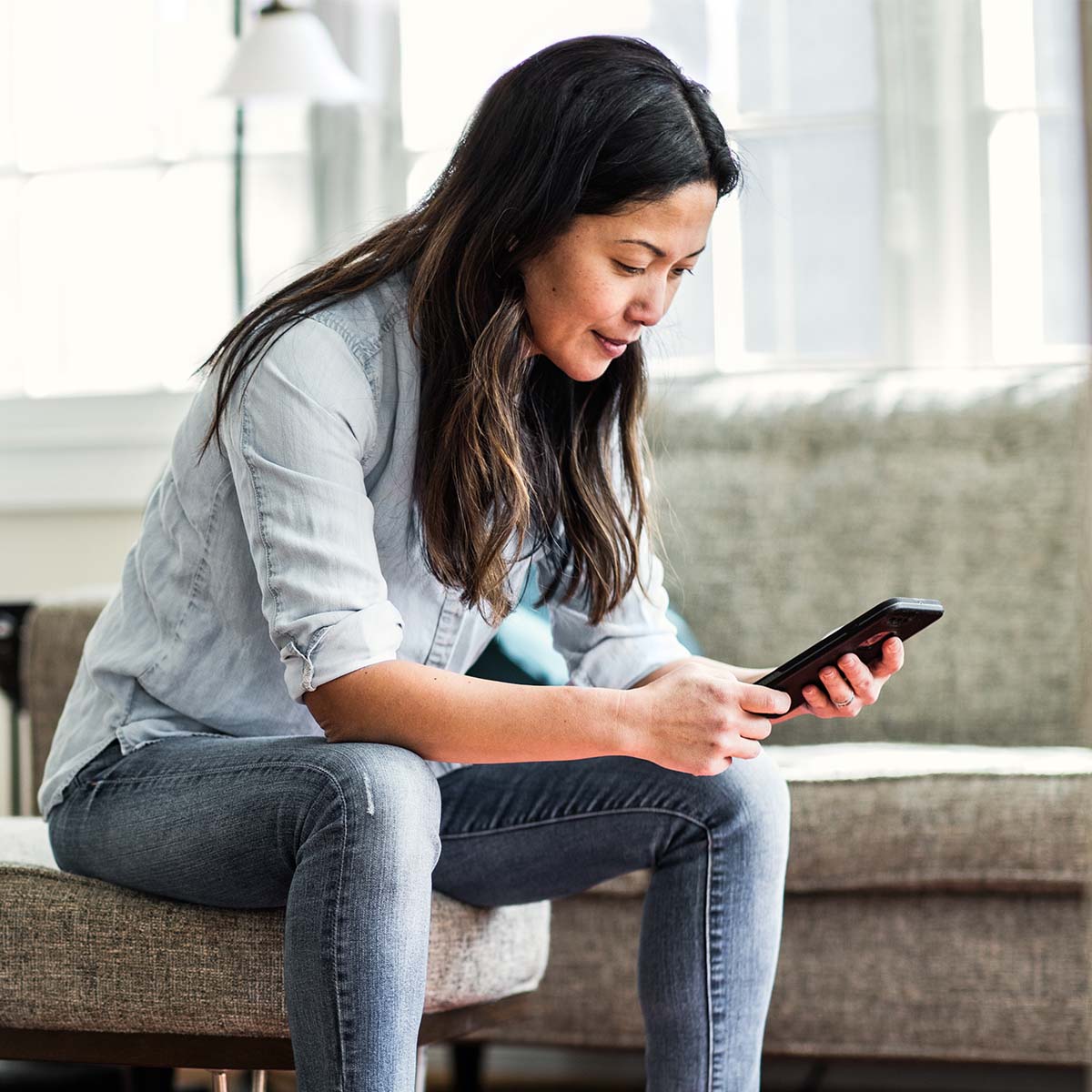 Business colleagues having coffee in a hotel lobby