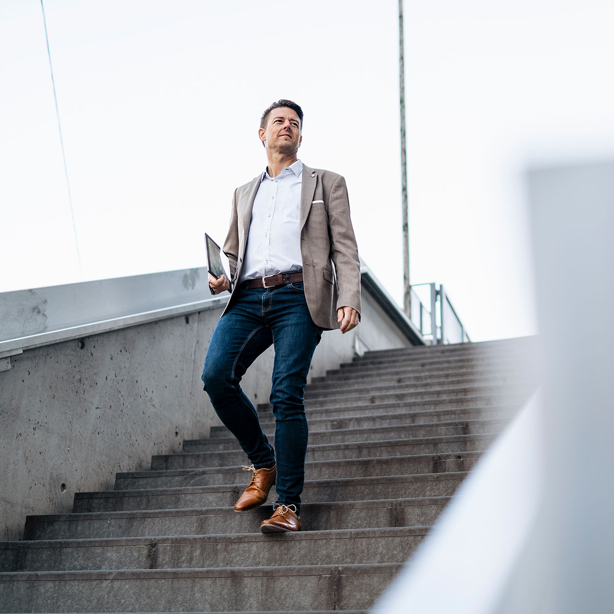 man walking down stairs
